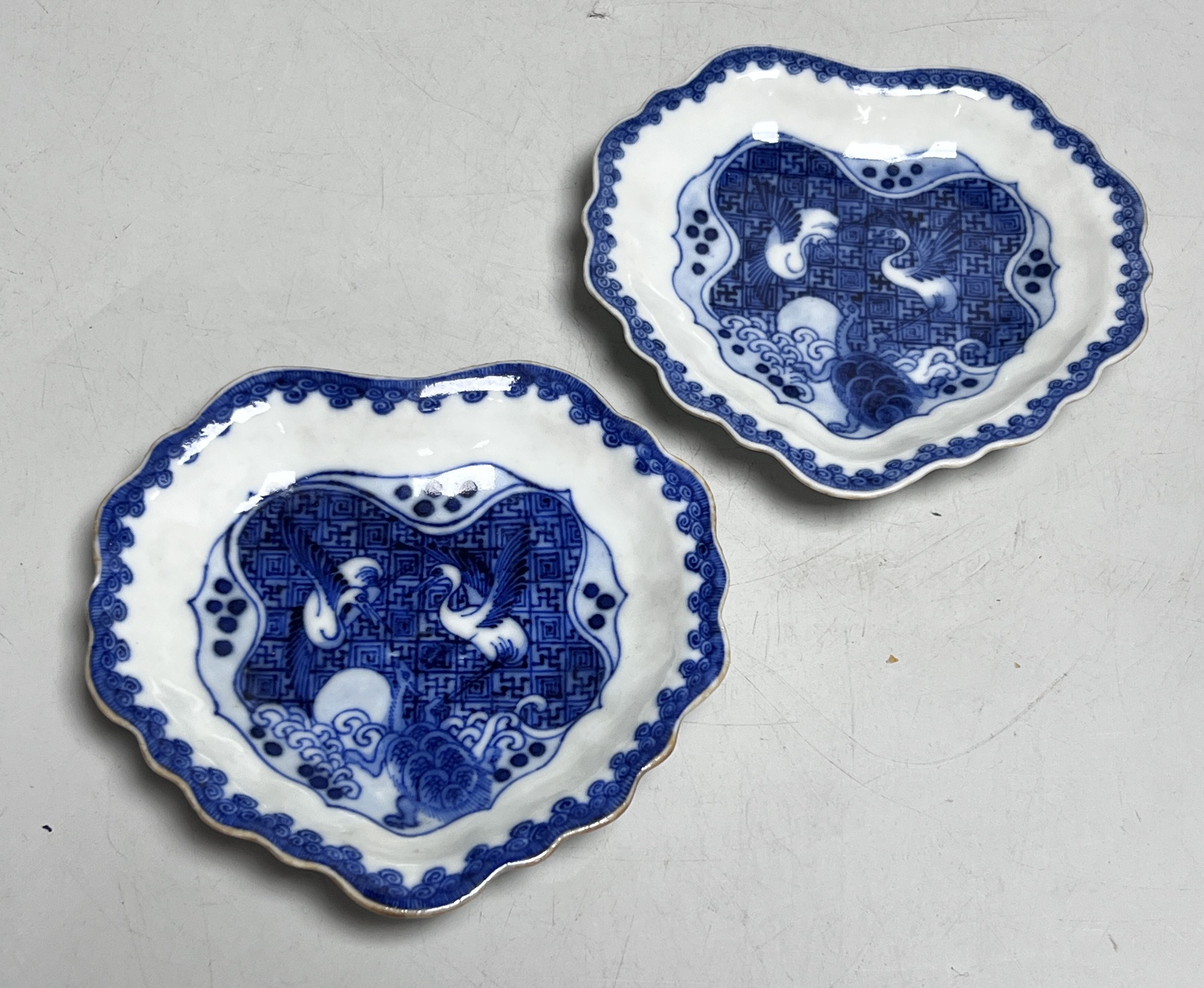 A pair of Chinese 'ko-sometsuke' leaf shaped dishes, 17th century, made for the Japanese market, each 12cm wide